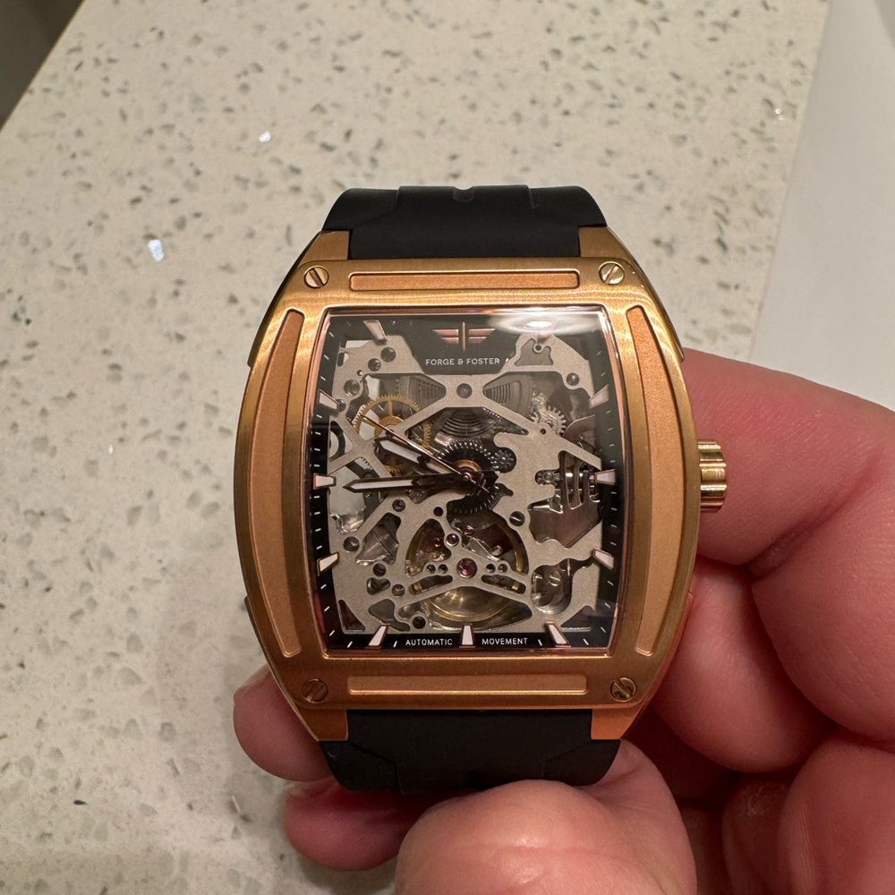 Gold and Black Skeleton Watch